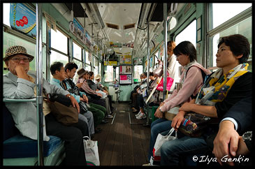 People are Traveling in an Old Tram in Kumamoto, Kyushu Region, Kyushu Island, Japan